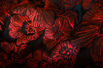 Draped matelasse jacquard fabric with floral pattern in red and black