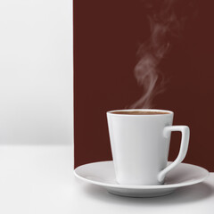 A cup of hot coffee on the dark. The cover of the menu.