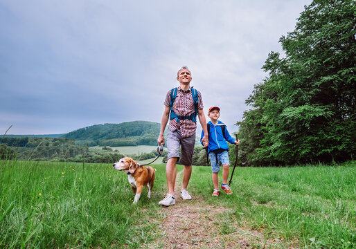 Father with son walk on mountain hills