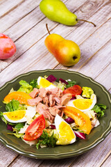 Tuna salad. Fish, eggs and vegetable salad