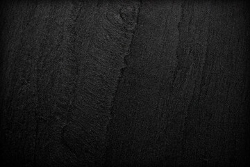 Dark grey black slate background or texture.