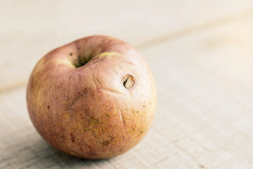 Apple rot on wooden.