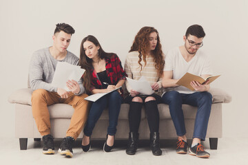 Young students preparing for exam at home