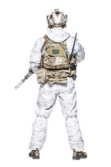 Fototapeta premium Special forces operator of Navy Seals armed with assault rifle with closed face in polarized sunglasses and military winter camo clothes designed to operations in extreme conditions. Studio shot