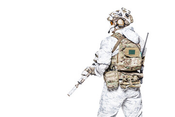 Special forces operator of Navy Seals armed with assault rifle with closed face in polarized...