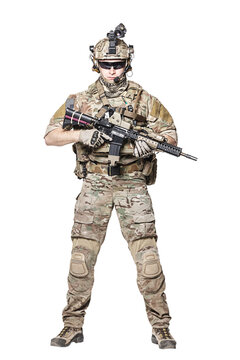 Elite member of US Army rangers in combat uniforms with his shirt sleeves rolled up, in helmet, eyewear and night vision goggles. Studio shot, white background