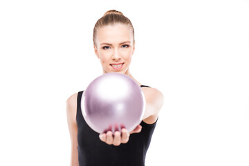 attractive rhythmic gymnast in leotard giving ball isolated on white