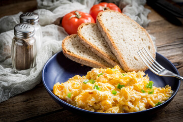 Scrambled eggs with onion and chives.