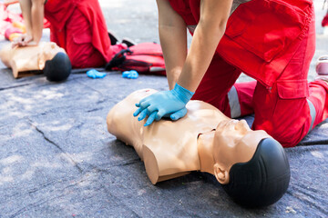 CPR. First aid training concept. Cardiac massage. - obrazy, fototapety, plakaty