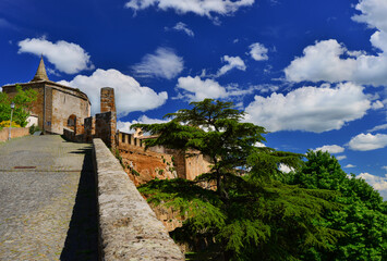 Fototapeta na wymiar Orvieto ancient walls with clouds in Umbria