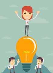 King of the hill, young successful businesswoman proudly standing on the top. Happy woman celebrating his success With the idea in light bulb.