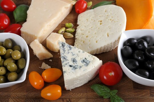 Cheeses and olives.