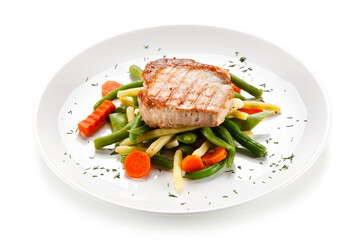 Roast steak with beans on white background
