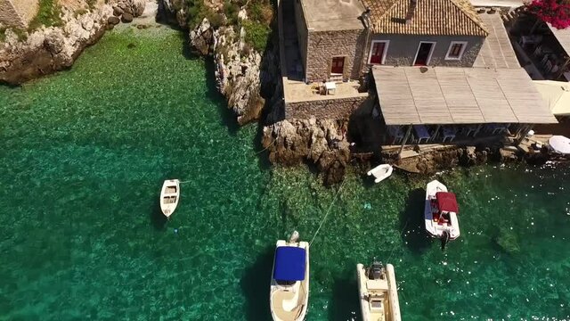 Aerial drone video of picturesque village of Limeni with clear waters, Mani, Peloponnese, Greece
