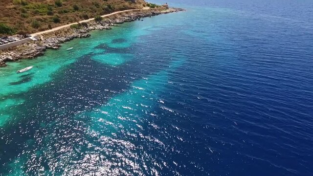 Aerial drone video of picturesque village of Limeni with clear waters, Mani, Peloponnese, Greece