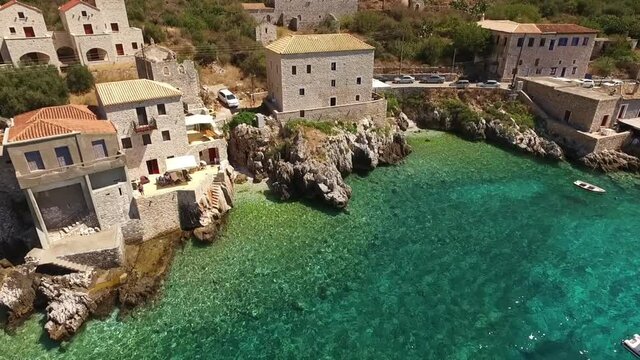 Aerial drone video of picturesque village of Limeni with clear waters, Mani, Peloponnese, Greece