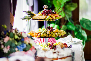 Delicious variety of fruit on the holiday table
