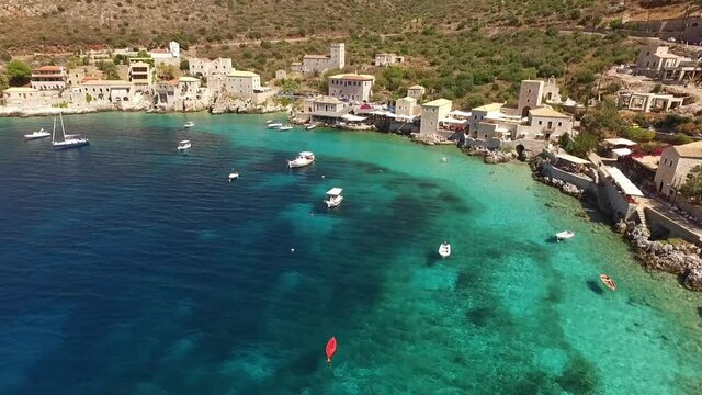 Aerial drone video of picturesque village of Limeni with clear waters, Mani, Peloponnese, Greece
