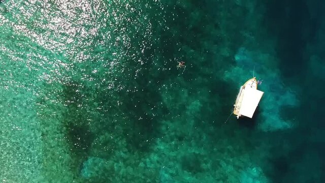 Aerial drone video of picturesque village of Limeni with clear waters, Mani, Peloponnese, Greece