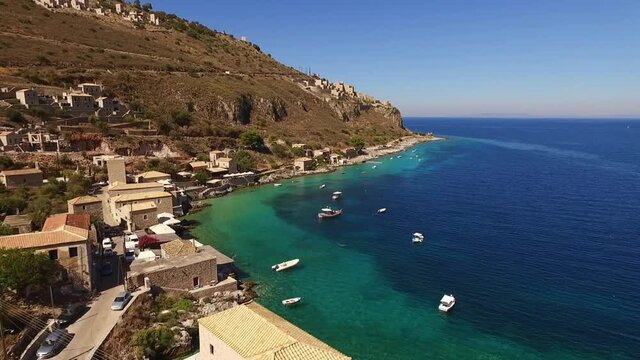 Aerial drone video of picturesque village of Limeni with clear waters, Mani, Peloponnese, Greece