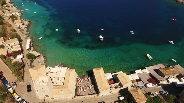 Aerial drone video of picturesque village of Limeni with clear waters, Mani, Peloponnese, Greece