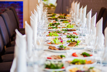 The colored cake on buffet