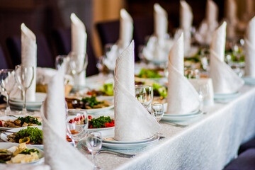The colored cake on buffet