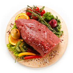 Fresh raw beef on cutting board on white background