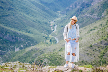 Fototapeta na wymiar joyful woman travel mountains