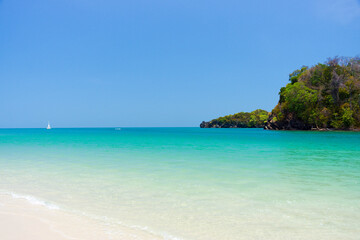 Naklejka na ściany i meble clear blue beautiful sea water and white sand beach in Thailand