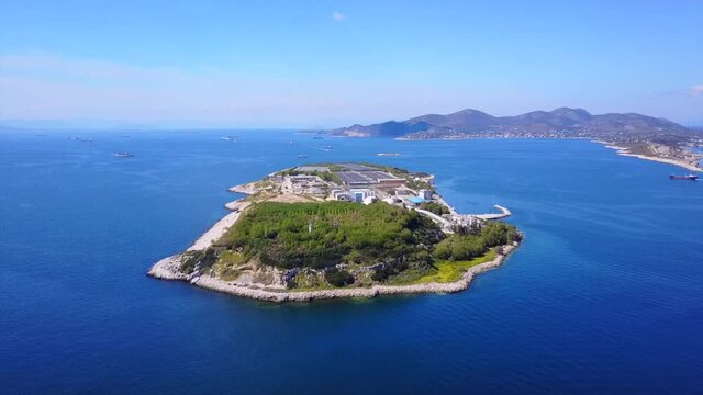Aerial drone video of Psitaleia island and industrial area of Peiraeus, Attica, Greece