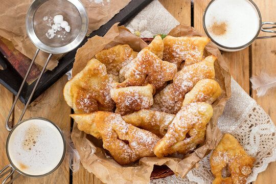 Sweet crisp pastry Angel wings with powdered sugar