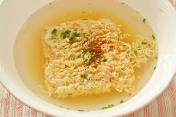 soft boiled instant noodles dressing seasoning on bowl