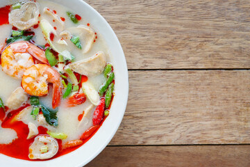 Prawn shrimp and lemon grass spicy soup with mushrooms, famous Thai food calling Tom Yum Kung , Menu design