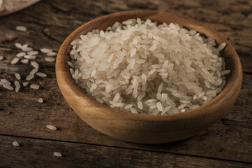 rice, jasmine rice, mali rice in Ladle and basket on the wood background