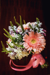 Wedding bouquet made of daisies and pink gerberas