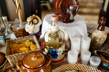 Bottle with vodka decorated with flowers