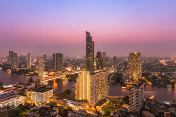 Aerial view cityscape and Chaophraya river in Bangkok, Thailand.