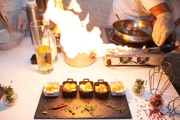 Chef with fire burner cooking stove