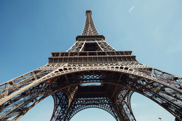 Fototapeta na wymiar Look from below at gorgeous Eiffel Tower