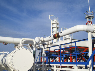 Heat exchangers in a refinery. Heated gasoline air cooler. The equipment for oil refining