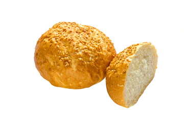 Sliced bun with sesame seeds on white background