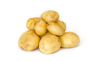 Pile of new potatoes on white background