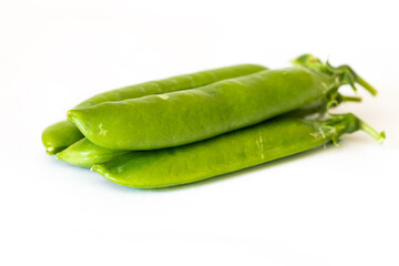 Pile of peas isolated on white background