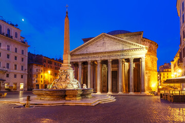 Fototapeta na wymiar The Pantheon, former Roman temple of all gods, now a church, and Fountain with obelisk at Piazza della Rotonda, at night, Rome, Italy