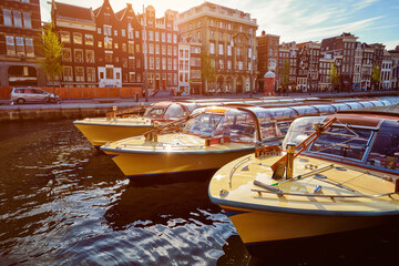 Amsterdam tourist boats in canal