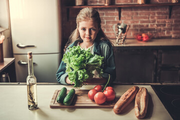 Teenage girl in kitchen