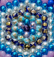 Background of beads,Italy,27 May 2017,Abstract background of beads of semiprecious stones,beads are colored, blue tint predominates