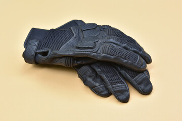 leather and textile gloves for riding a motorcycle or bicycle