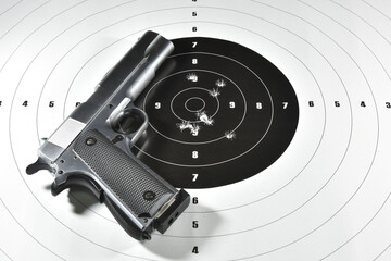 handgun and shooting target